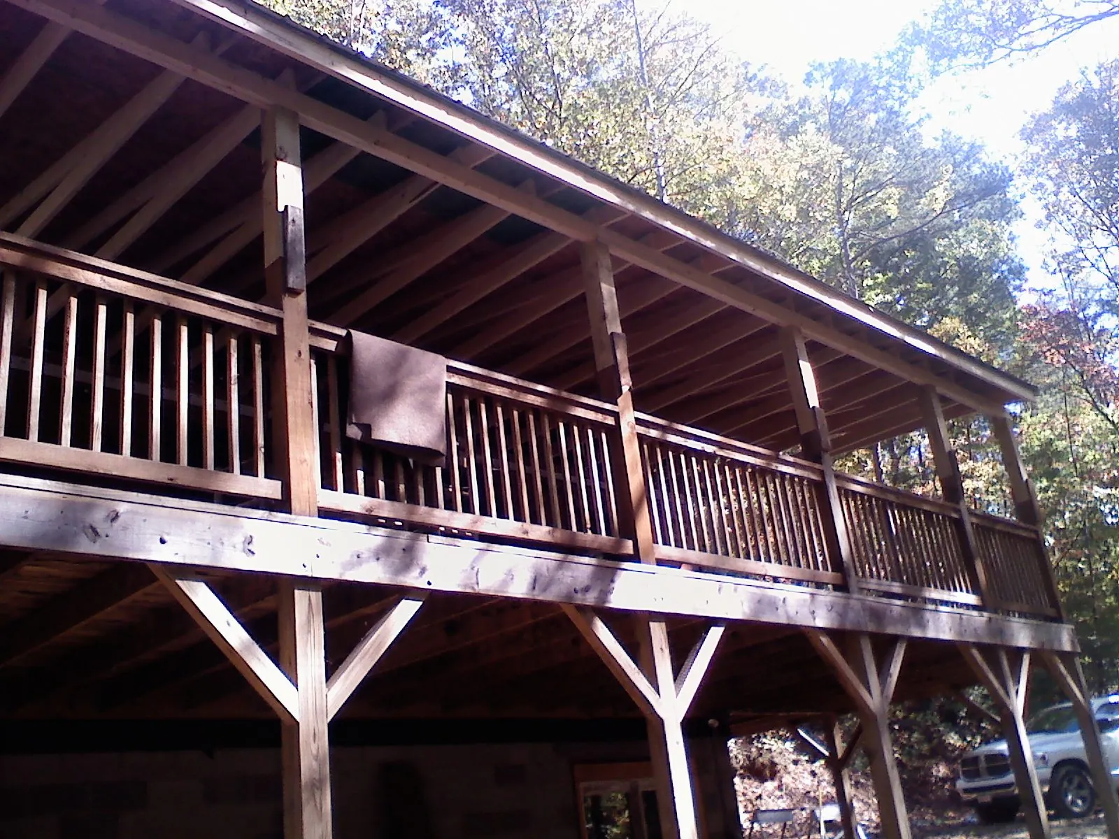 Timber framing under a new elevated porch and deck — Roof Leak Repair in Orleans by Roofing Brothers